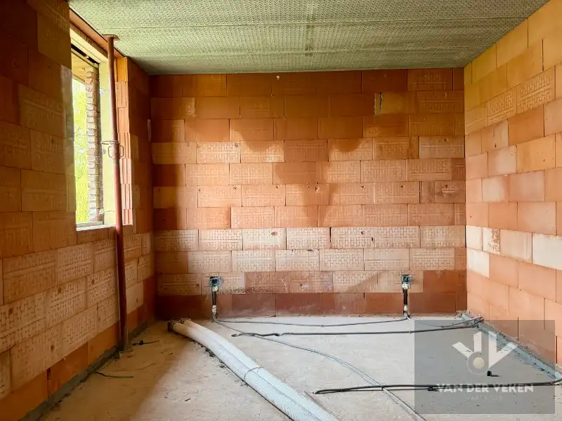 Moderne halfopen nieuwbouwwoning met 4 slaapkamers en 2 badkamers met carport foto 12