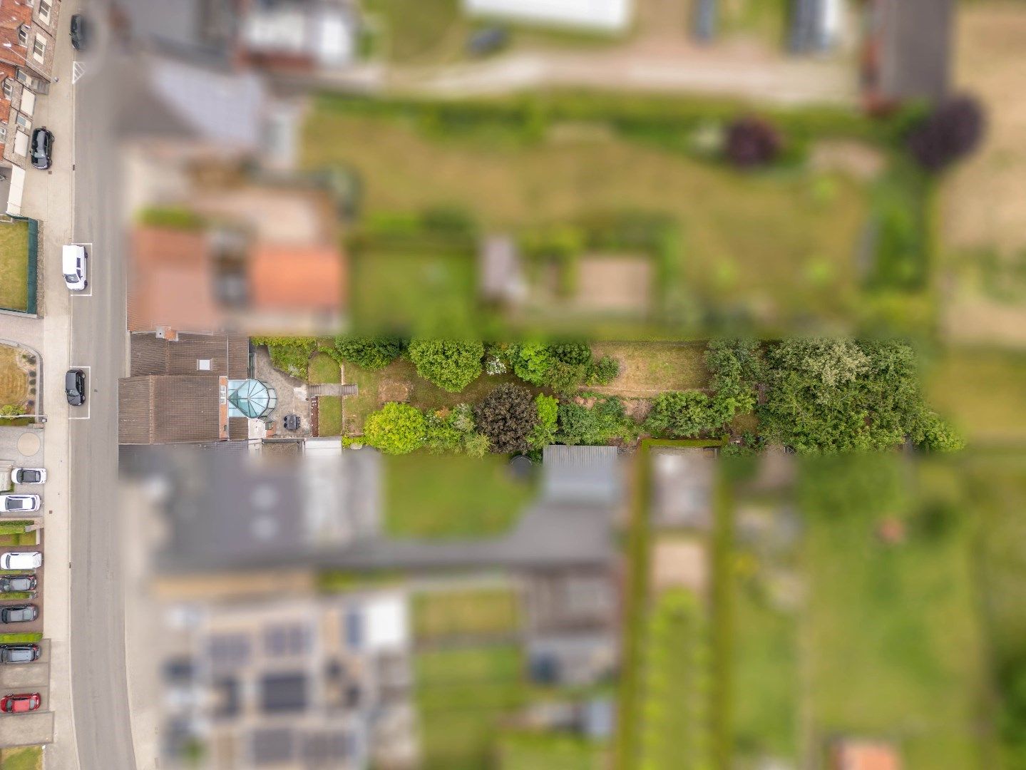 Verzorgde, op te frissen woning met 3 slaapkamers en uitbreidingsmogelijkheden, garage en tuin op 10a, vlak bij het centrum van Hoeselt foto 29