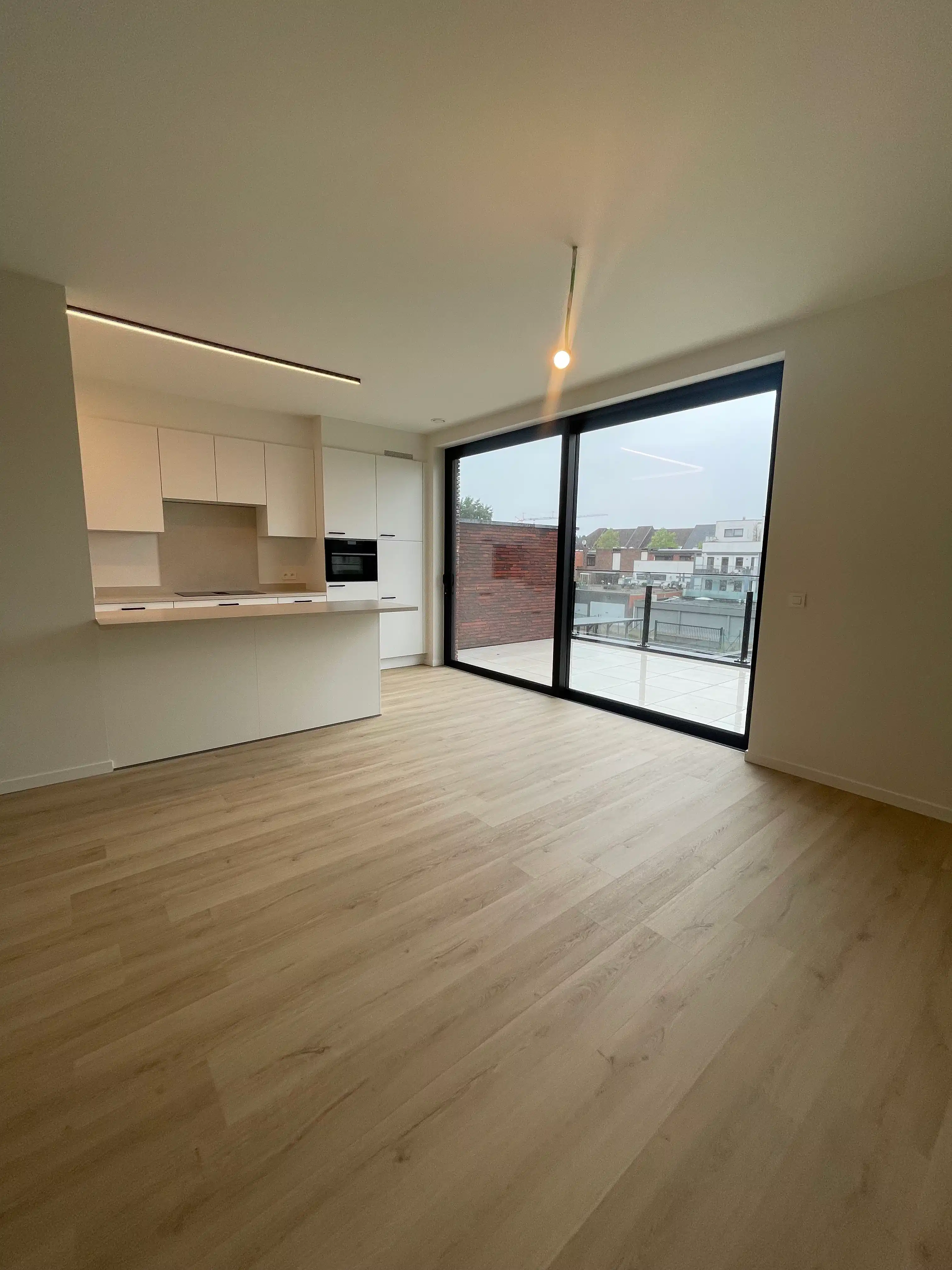 Te huur: nieuwbouwappartement met 2 slaapkamers – Dorpsstraat 26, Houthalen foto {{pictureIndex}}