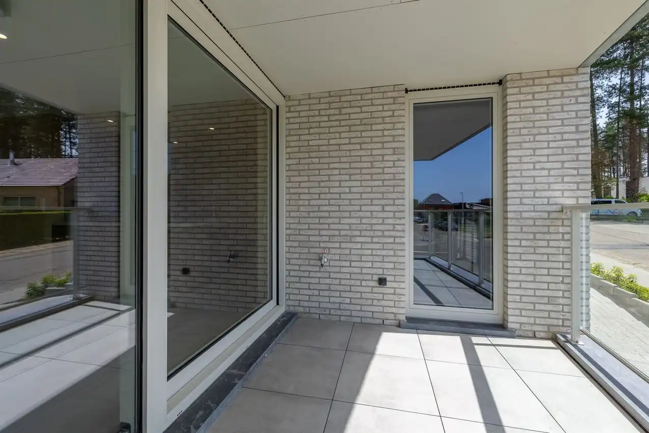 Gelijkvloers app. met twee slaapkamers, zuidterras, garage nabij bossen foto 10