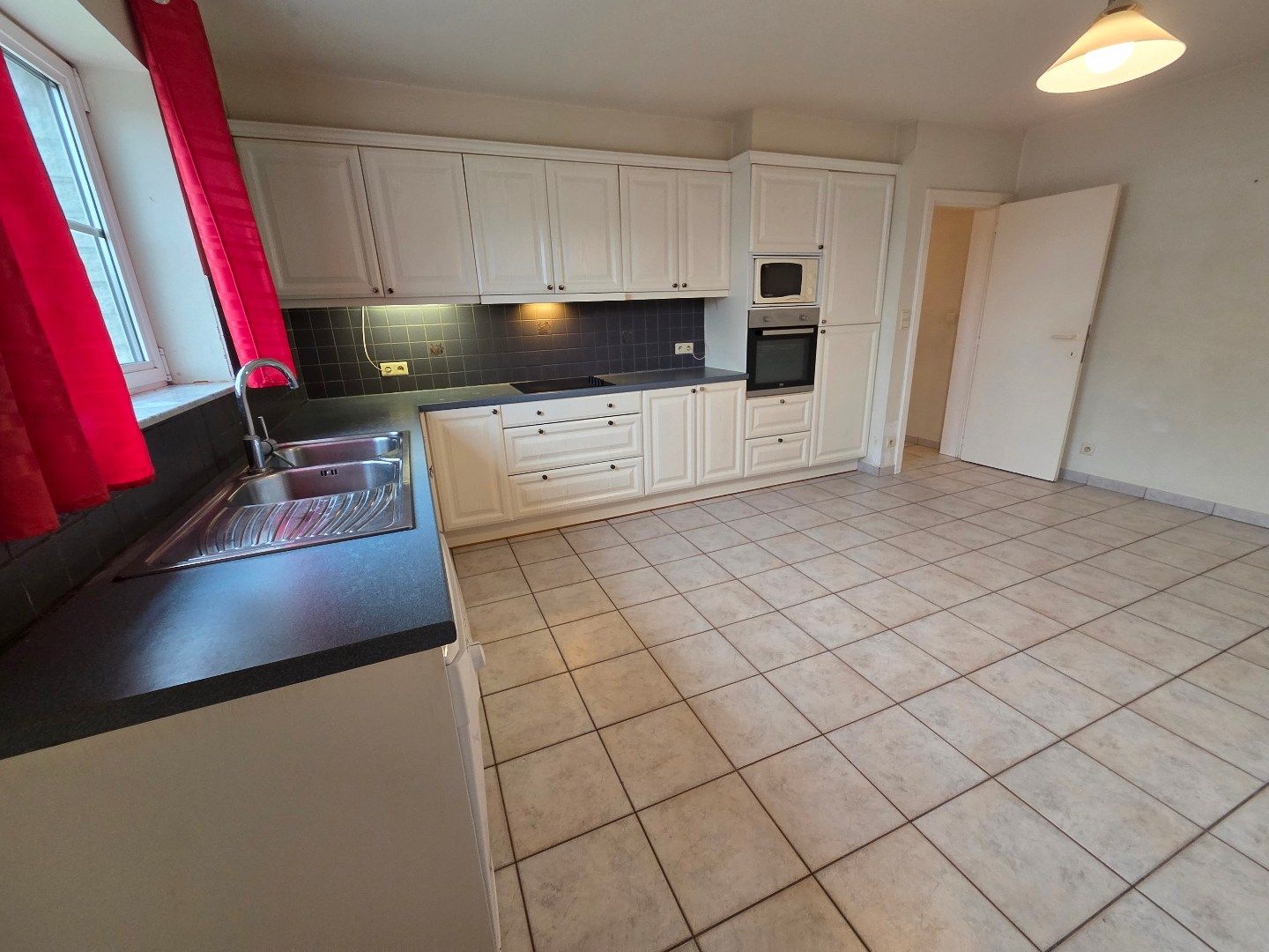 Ruim dakappartement met 3 slaapkamers in Boortmeerbeek. foto 6