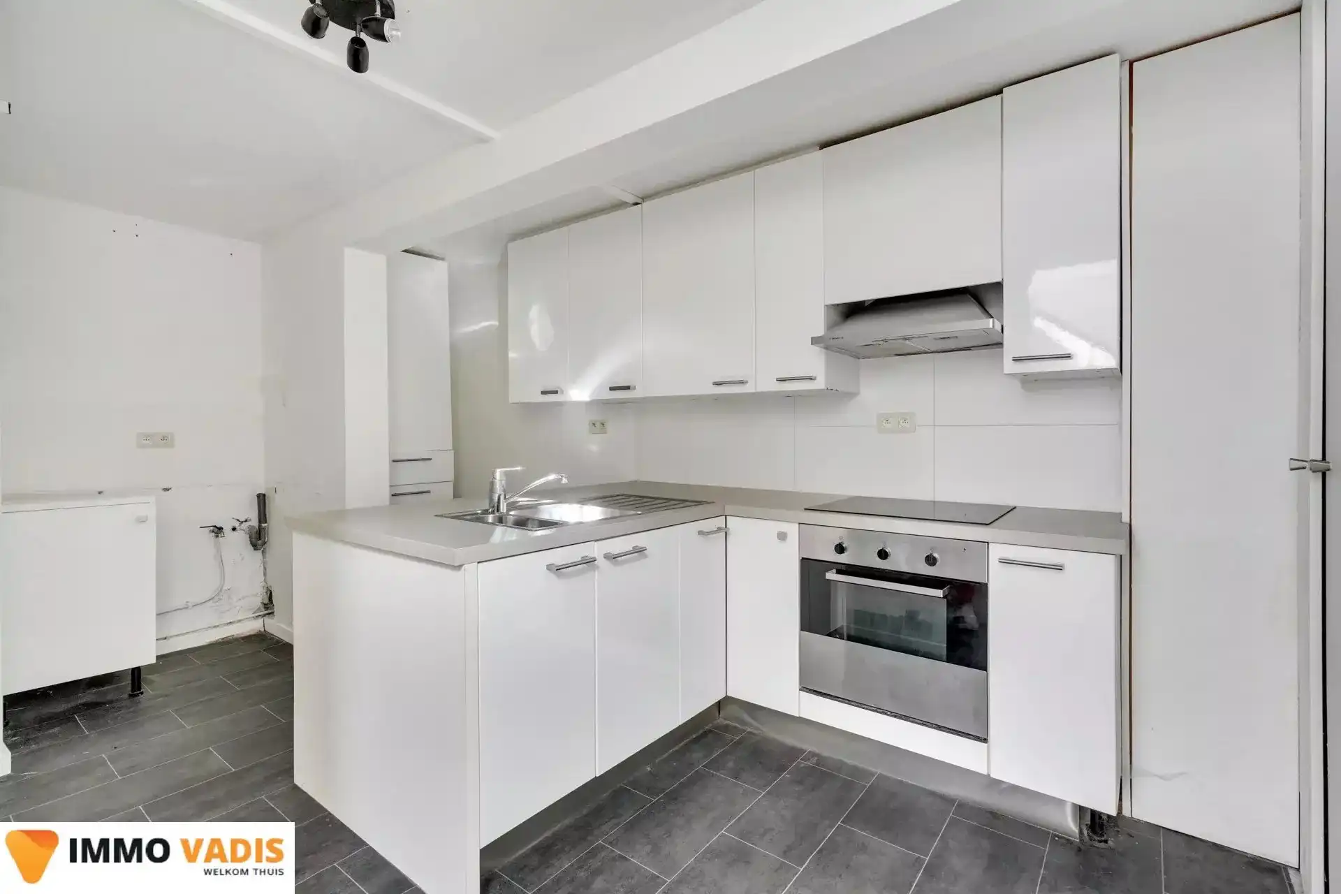 Ruim gelijkvloers appartement met  3 slaapkamers foto 11