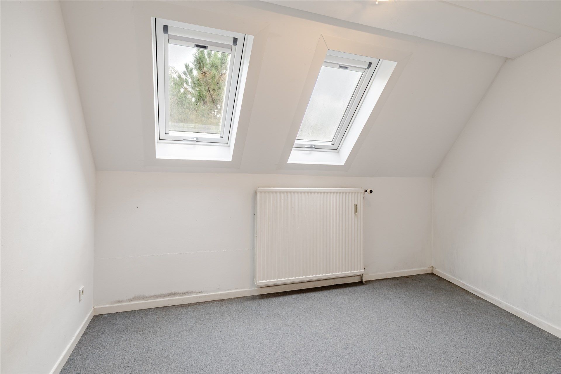 Opbrengsteigendom bestaande uit 4 appartementen + 22 garageboxen + magazijn/werkplaats foto 7