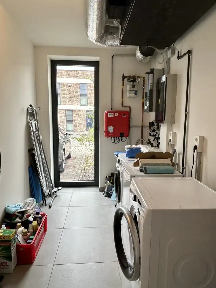 Recente, energiezuinige woning met tuin en garage op een gunstige ligging foto 11