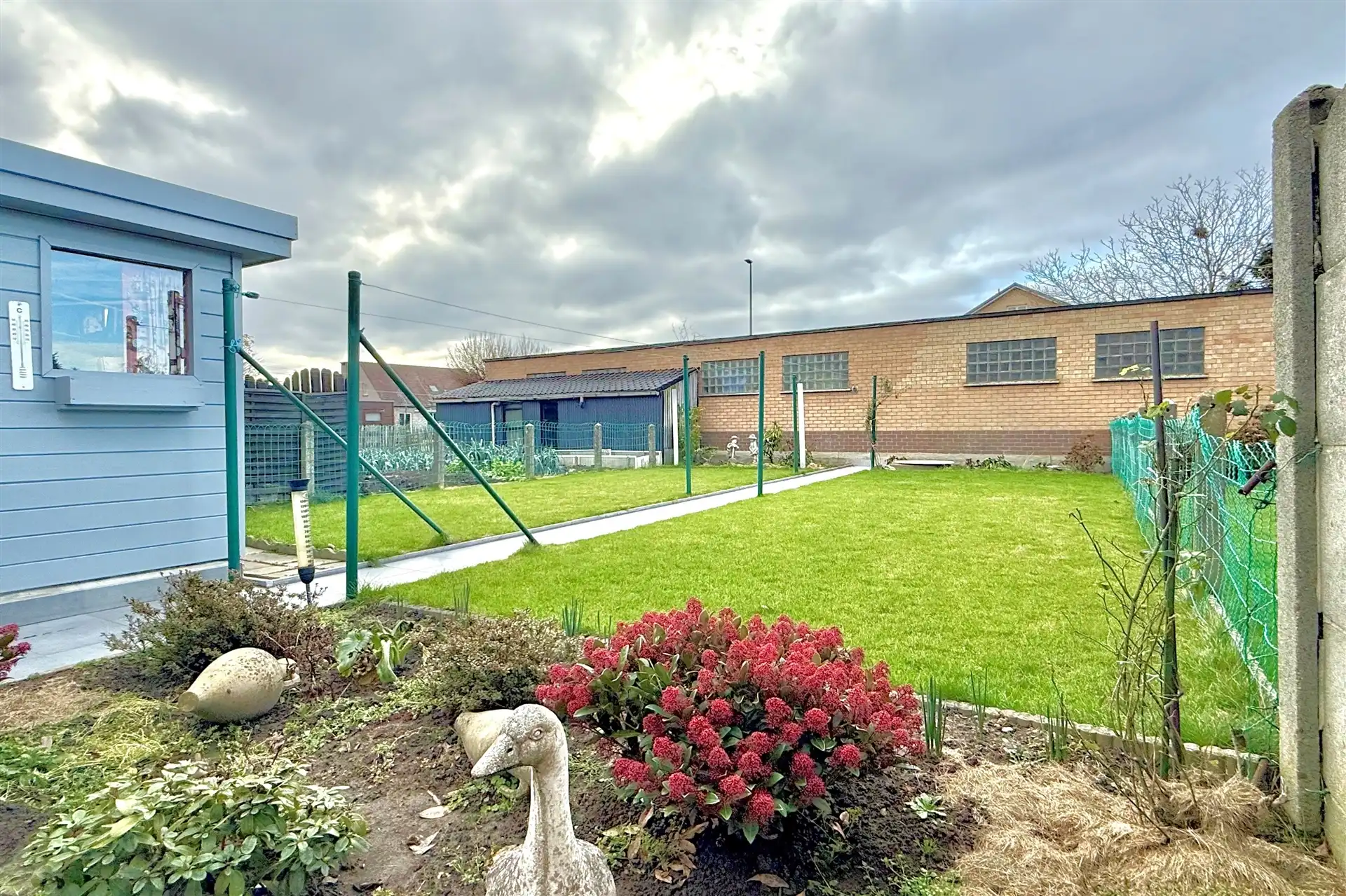 Ruime woning met garage, 4 slpk & tuin foto 25