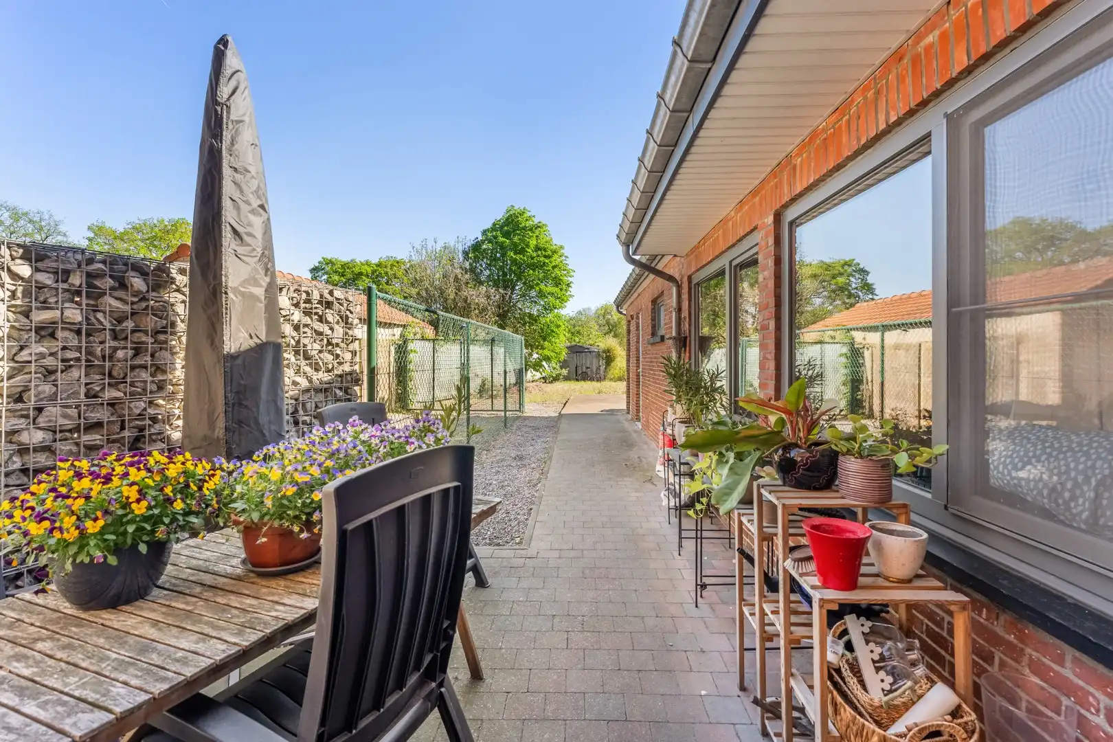 Droomt u van een woning te koop met ruimte, een groot perceel en heel wat mogelijkheden? Dan is deze halfopen bebouwing op een perceel van 10 are 14 absoluut het ontdekken waard 🏡. foto 12
