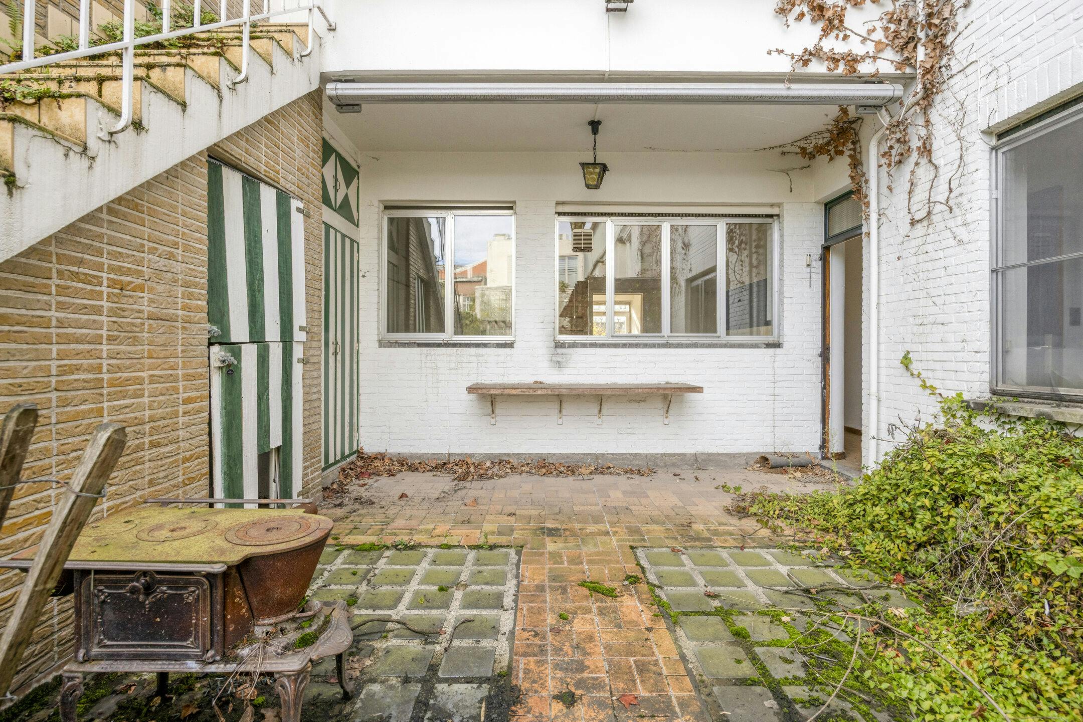 Te renoveren opbrengsteigendom met 3 appartementen en handelspand in Antwerpen foto 19