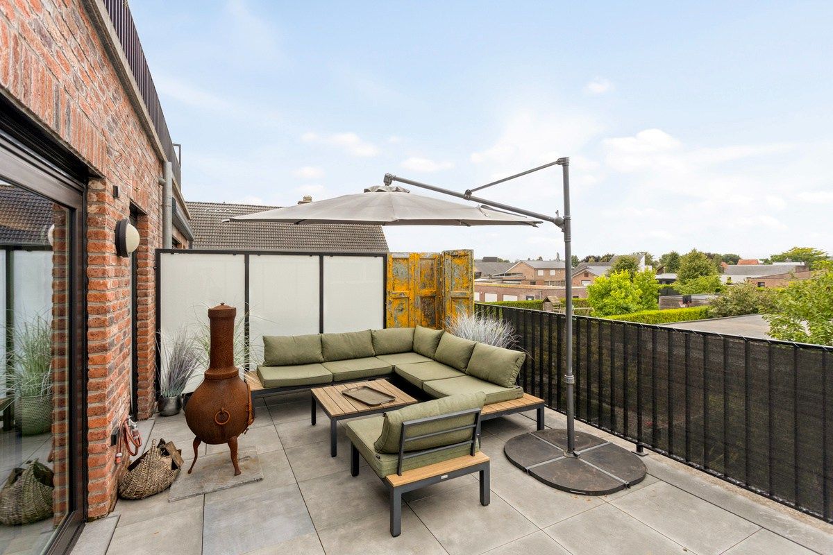 Knap ingericht éénslaapkamerappartement met groot ZW terras. foto 4
