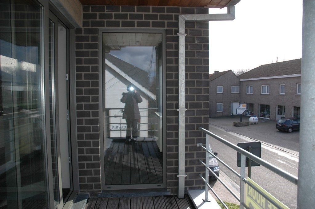 Duplex appartement 1ste verdieping voorkant gebouw foto 11