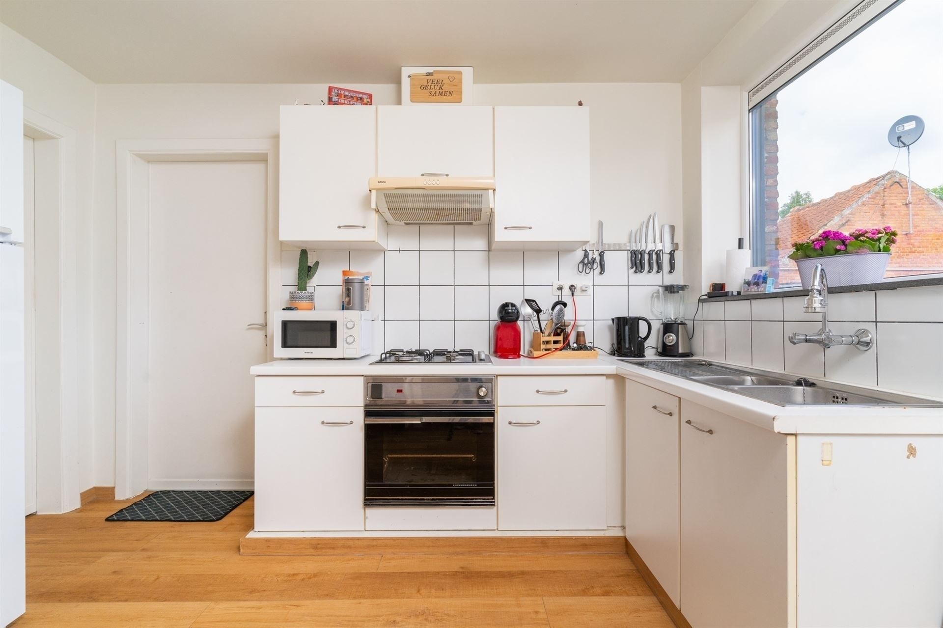 Meergezinswoning bestaande uit 2 app, tuin en dubbele carport foto 8