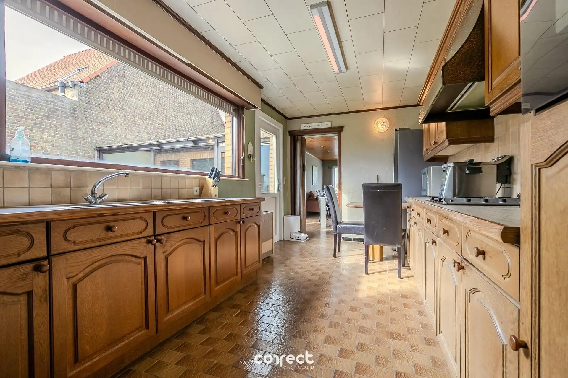 Halfopen bebouwing met garage gelegen op een gunstige ligging en prachtig zicht op de velden. foto 3