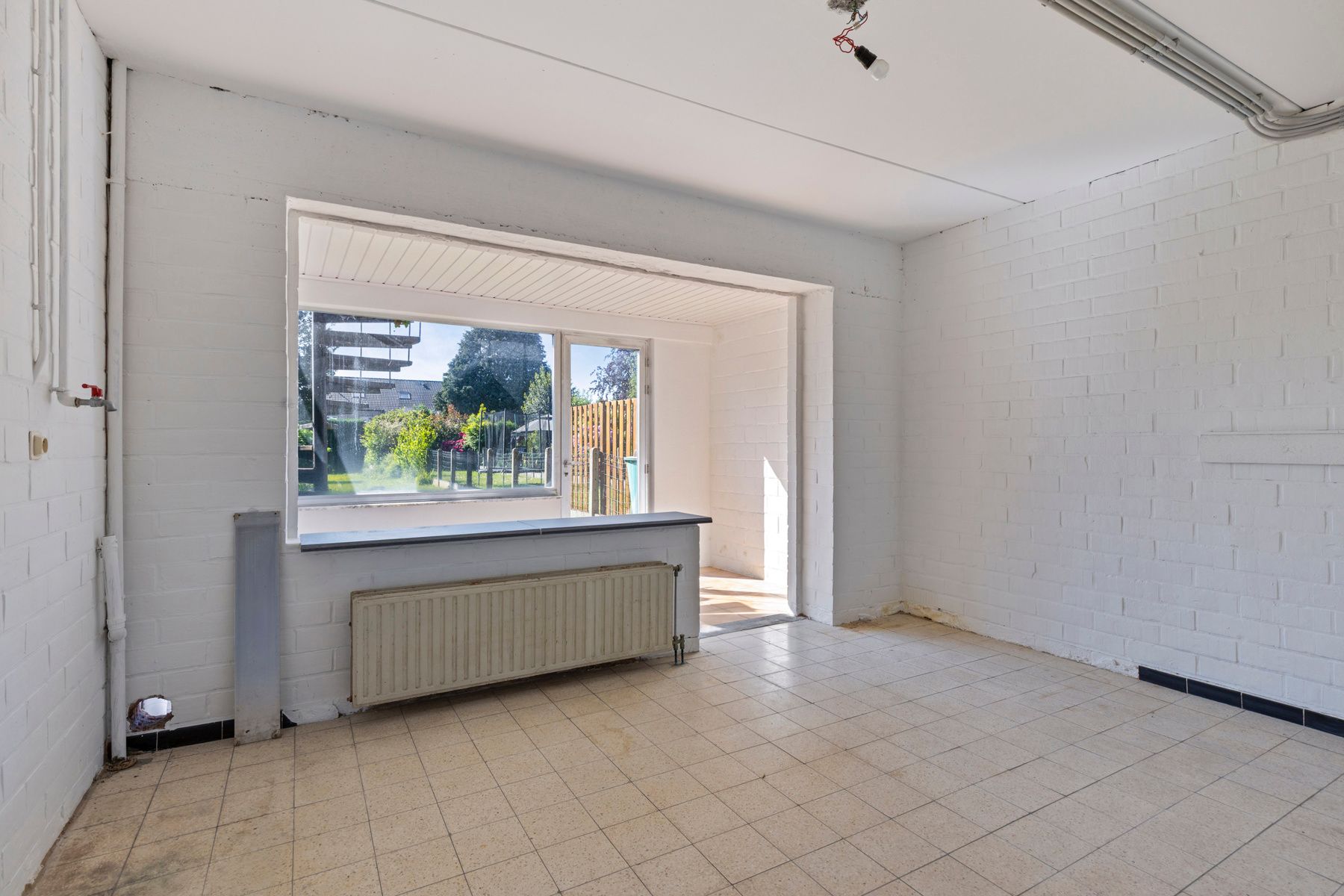 OPTIE Gunstig gelegen woning met 3 slaapkamers en garage foto 10