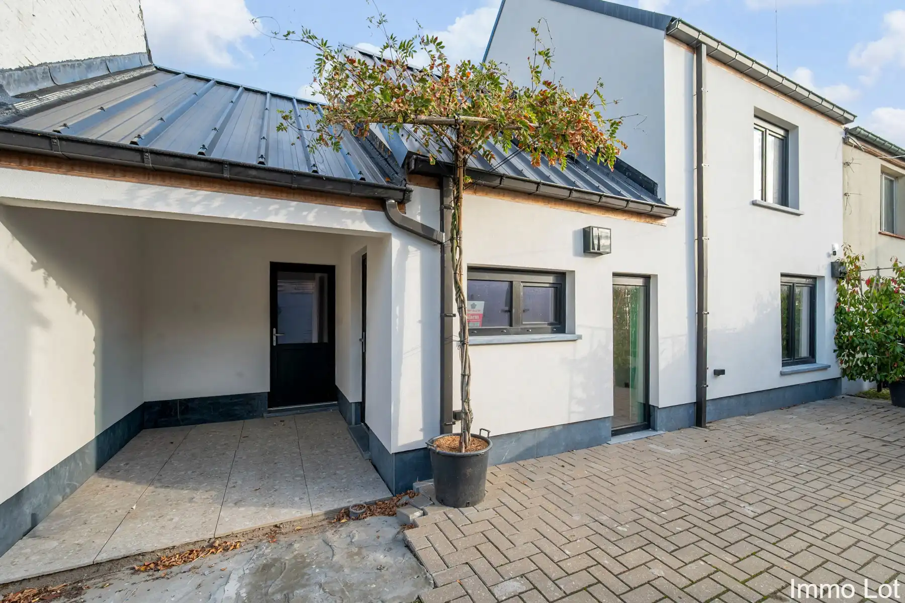 Knap gerenoveerde woning met terras foto 16