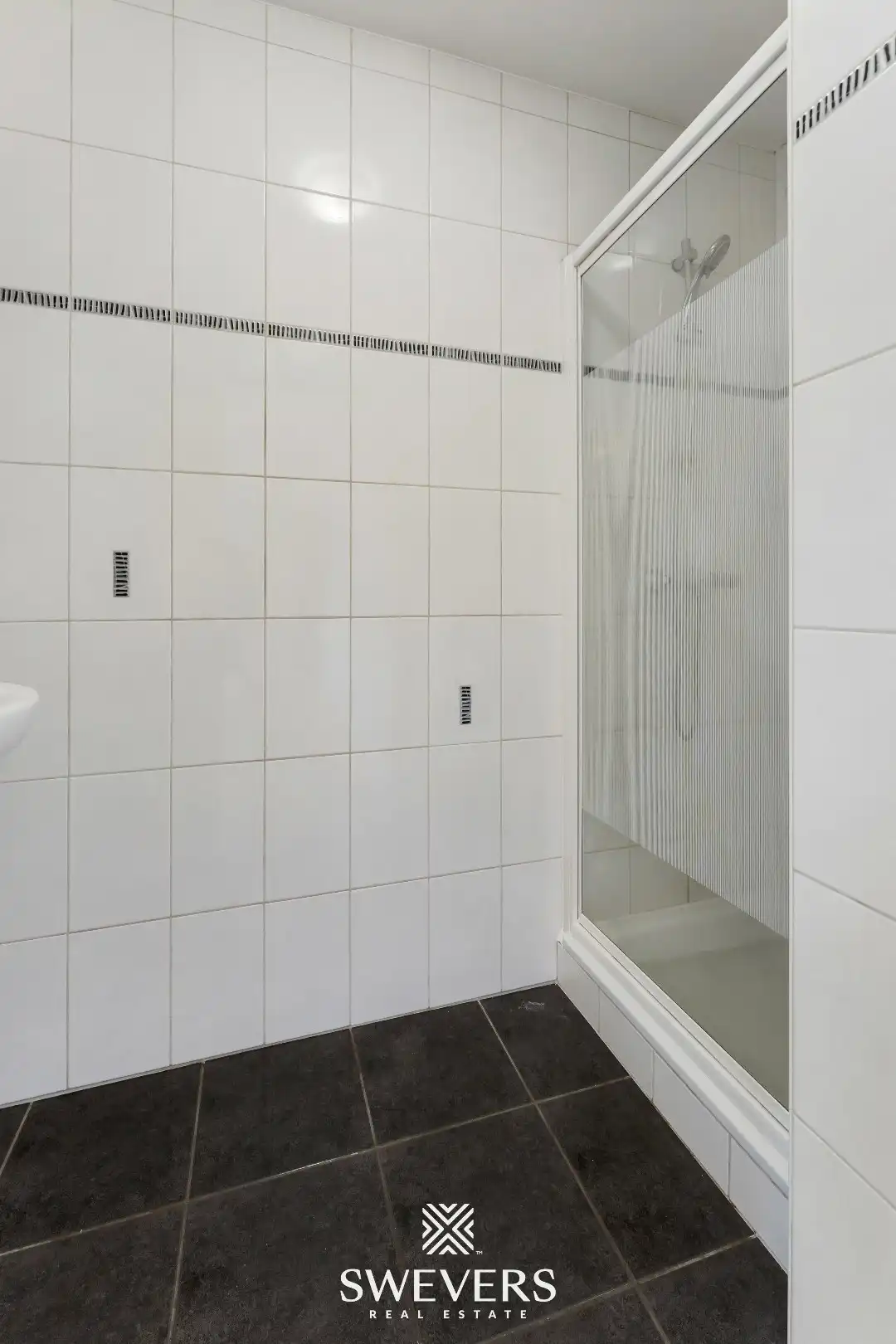 Ruim duplex appartement met 2 slaapkamers en tuin foto 12