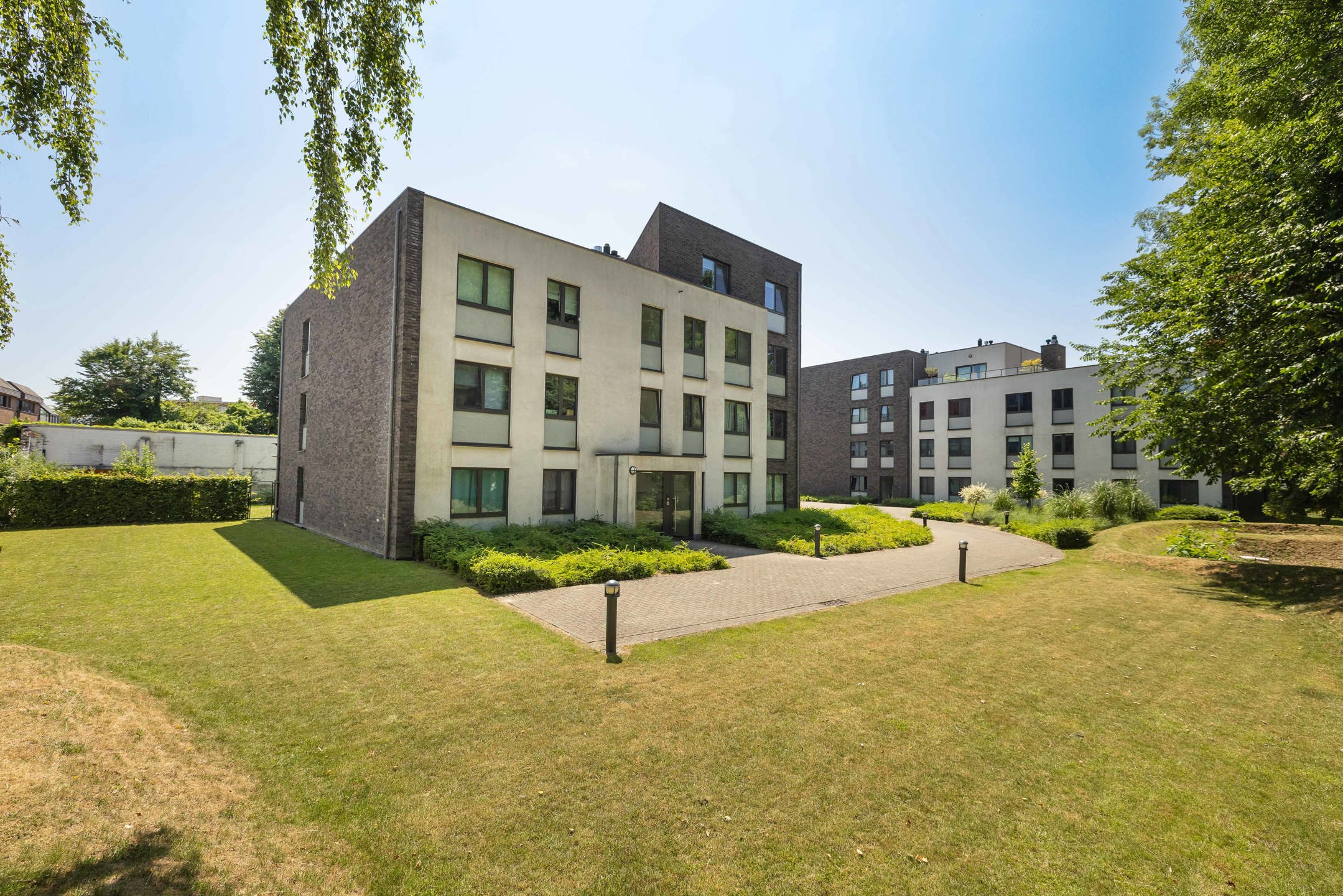 Appartement 3 slaapkamers ± 130 m² + tuin ± 200 m² + parkeerplaats foto 20
