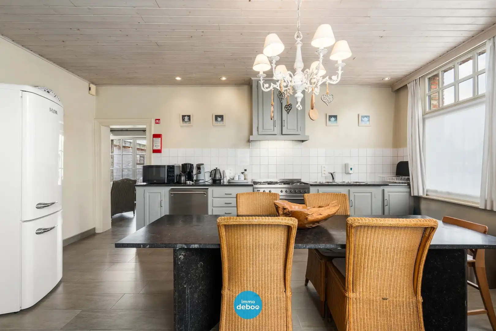 Uitzonderlijk ruime polyvalente woning met zuidgerichte tuin foto 4