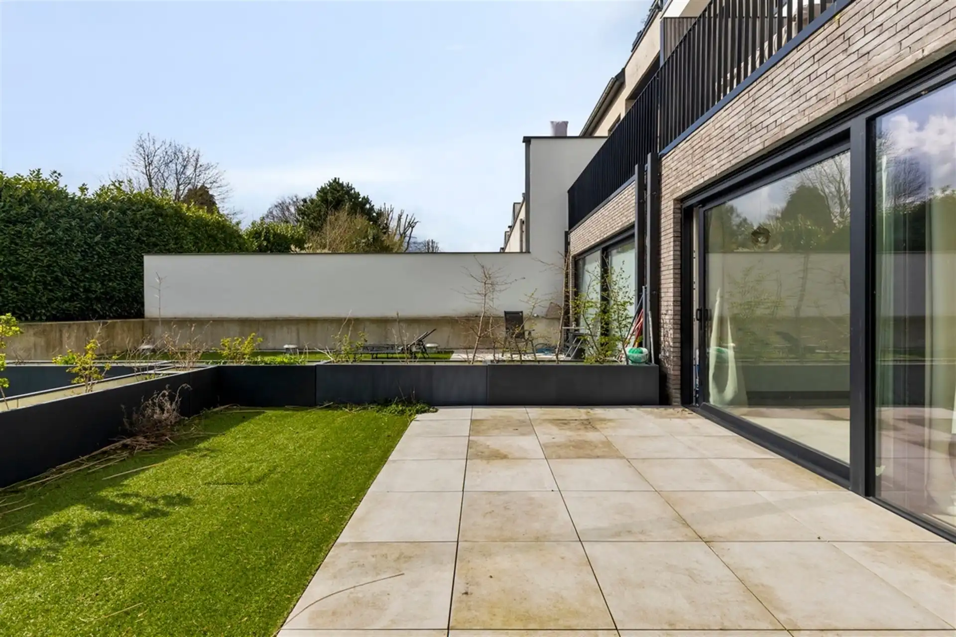 Gelijkvloers appartement met groot terras en tuin foto 8