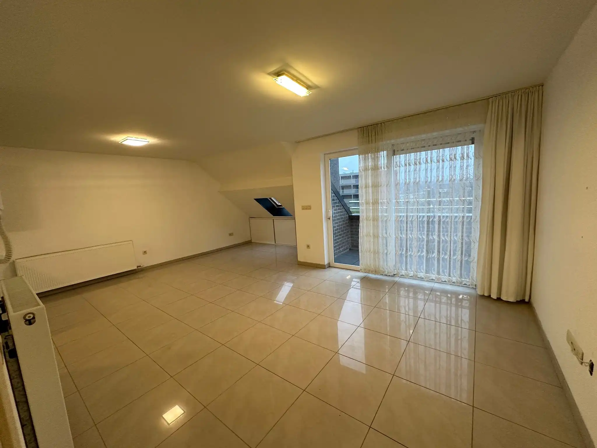 Dakappartement met 2 ruime slaapkamers te Eisden centrum foto 3