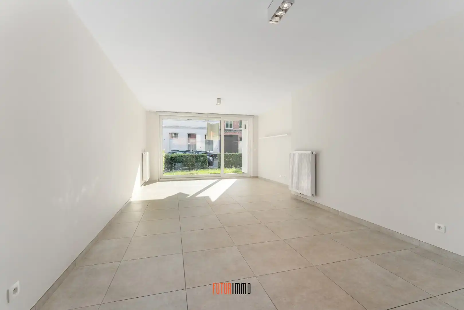 Lichtrijk gelijkvloersappartement met tuintje te Brugge foto 4