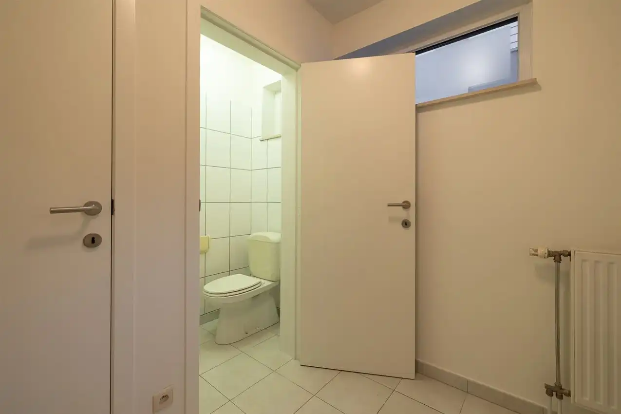 Stadswoning met vier slpk, garage te midden van centrum foto 25