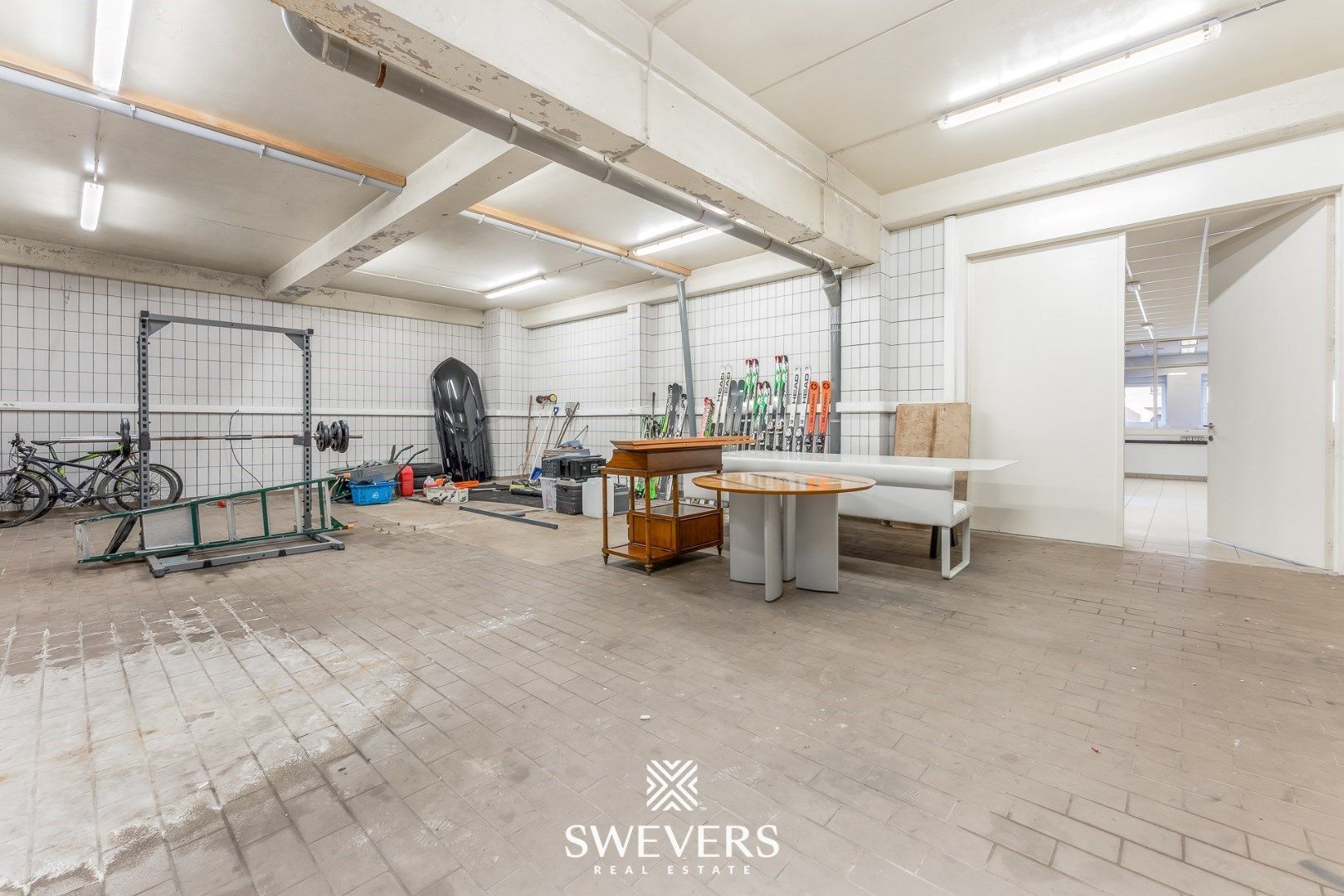 Handelspand met ruime woning in hartje Lummen – een unieke opportuniteit foto 28