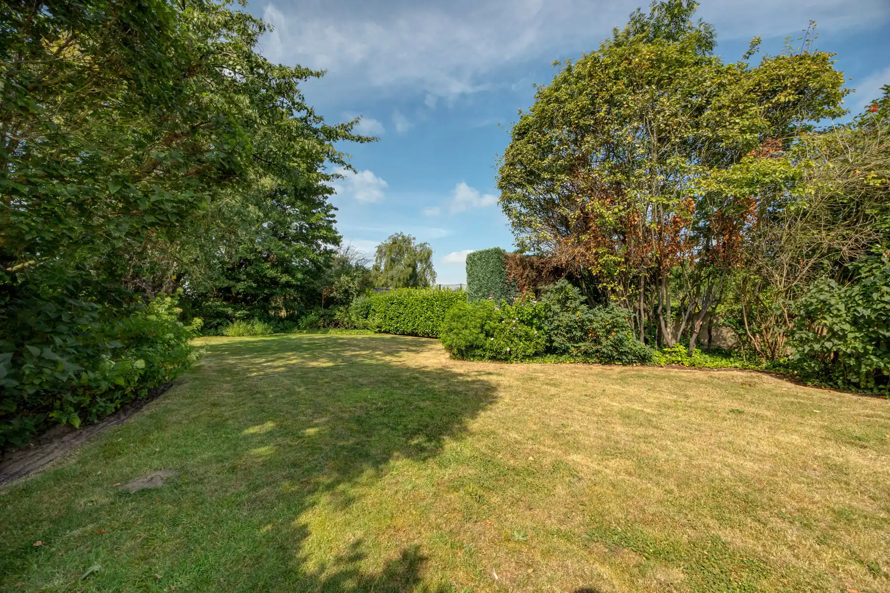 Halfopen bebouwing met garage en zuidwest-tuin! foto 16