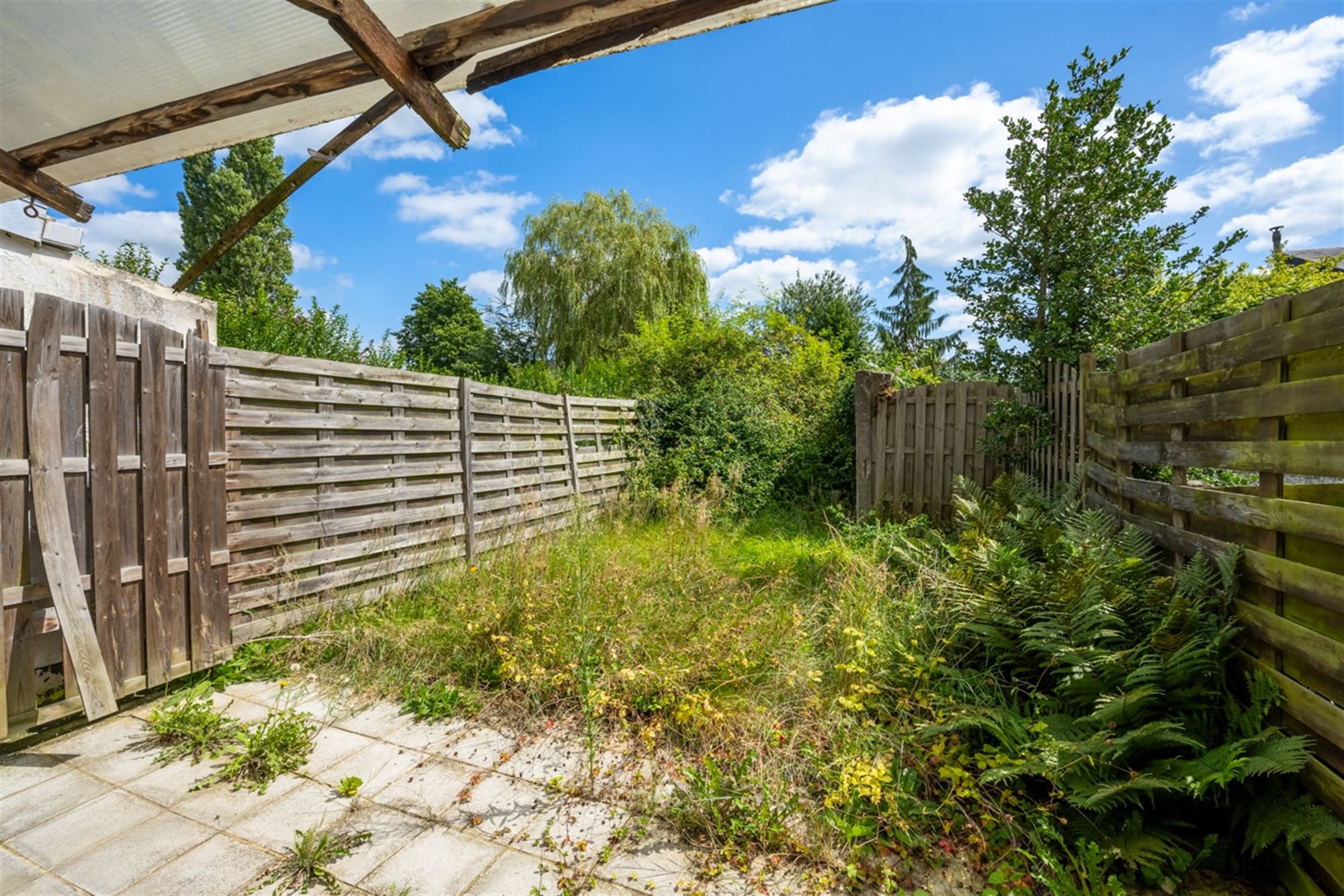 Te renoveren gezinswoning met tuin vlakbij centrum Aalst foto 11