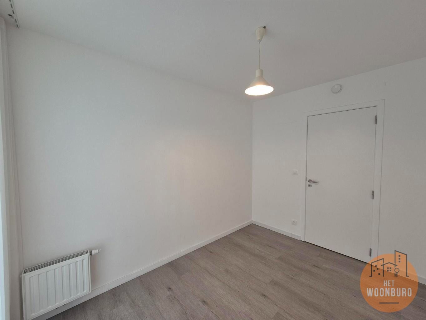 Gelijkvloersappartement met tuin, kelder en parkeerplaats foto 9