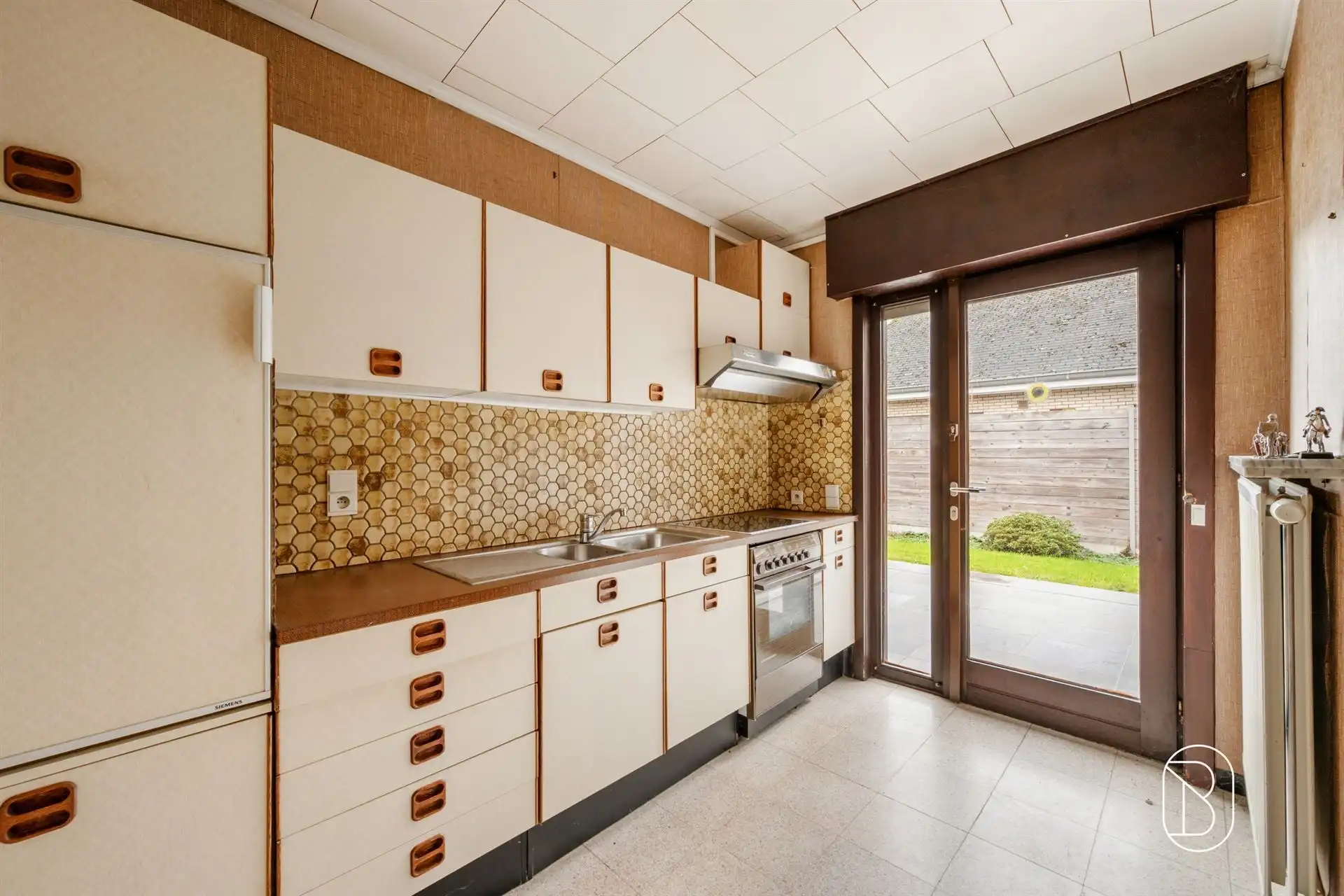 Bungalow met 3 slk, garage en tuin op rustige ligging! foto 10