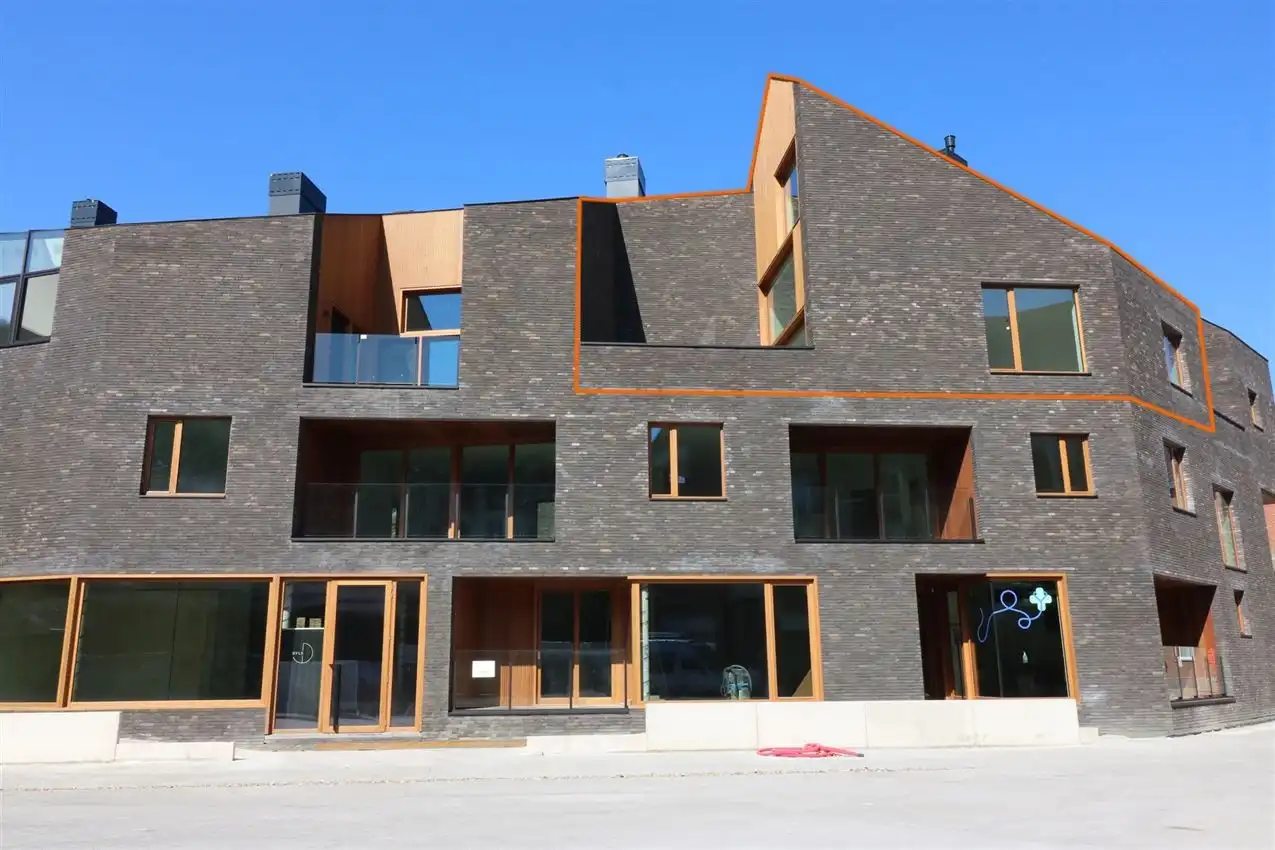 Bijzonder opgevat penthouse, 2 slpk., garage, groot terras foto {{pictureIndex}}