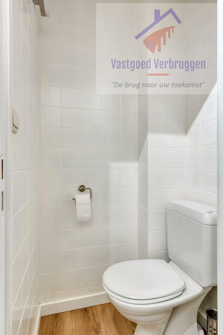 Gelijkvloers appartement met garagebox en prachtige tuin foto 9