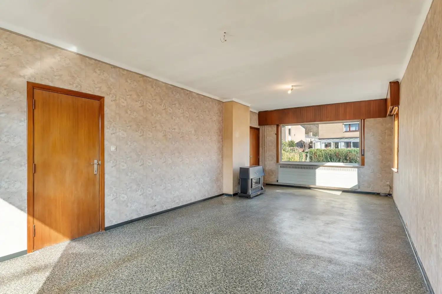 Goed gelegen en half open woning met 3 ruime slaapkamers, een extra leefruimte, een garage en een tuin te Kessel-Lo! foto 4