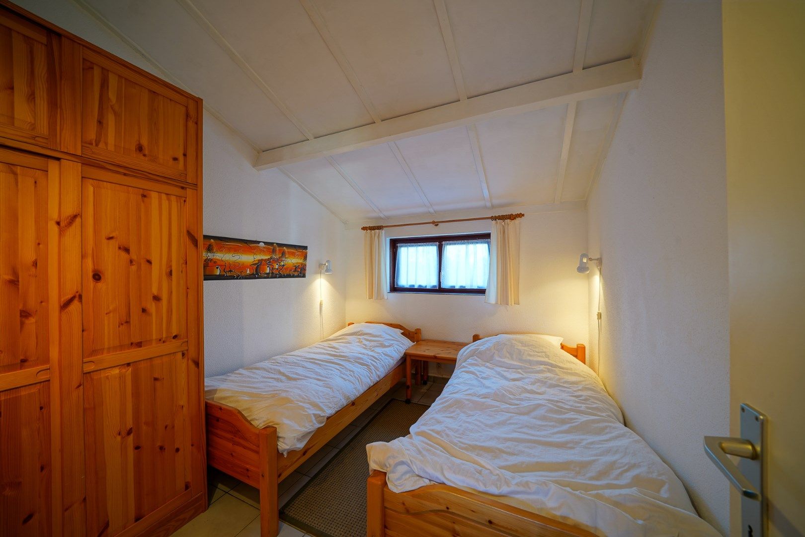 Instapklare vakantiewoning met zonnige tuin en 2 slaapkamers foto 8