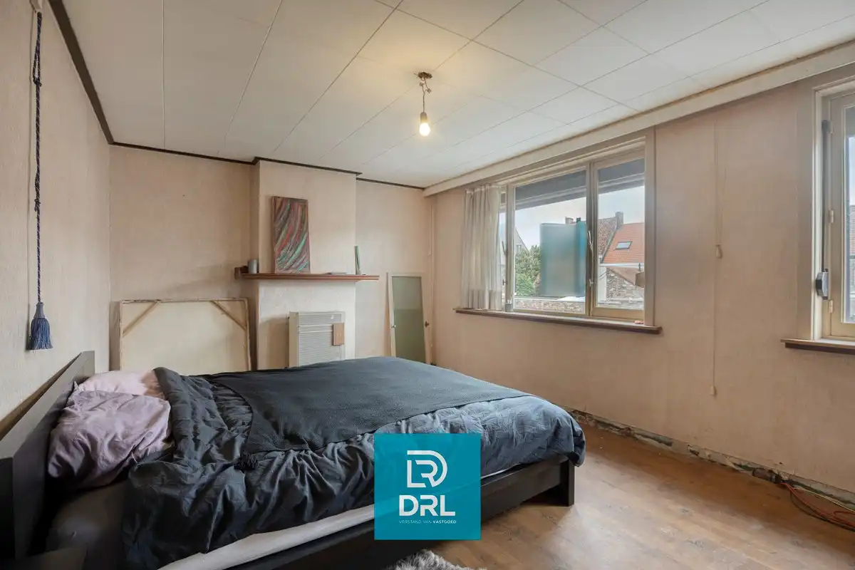 Af te werken woning met grote werkplaats/loods te Sint-Kruis. foto 12