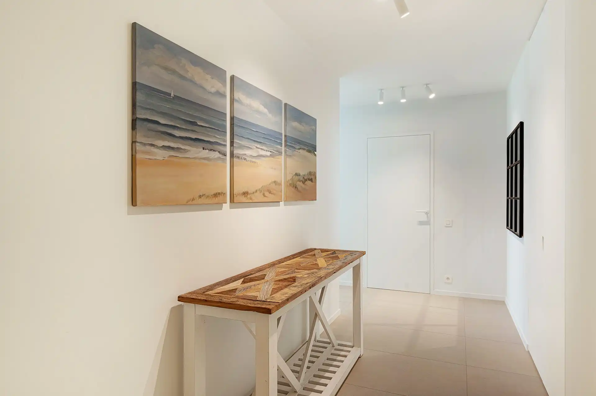 Exclusief gerenoveerd hoekappartement met 3 slaapkamers en riant zonneterras van 40 m² foto 2