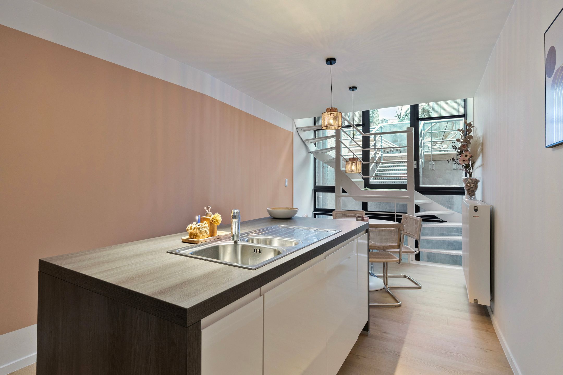 Instapklaar triplex appartement met terras en tuin foto 3