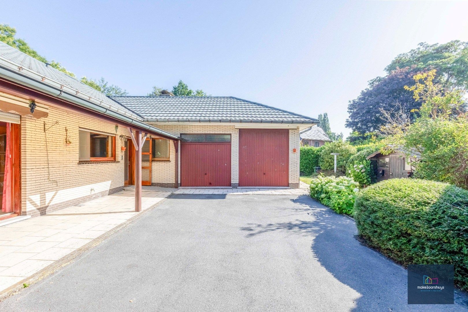Rustig gelegen ruime bungalow met dubbele garage in Drongen foto 22