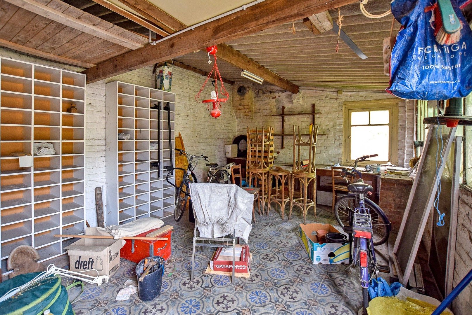 Goed gelegen te renoveren rijwoning bestaande uit een voorgebouw en achterbouw, pal in het centrum van De Panne.  foto 21