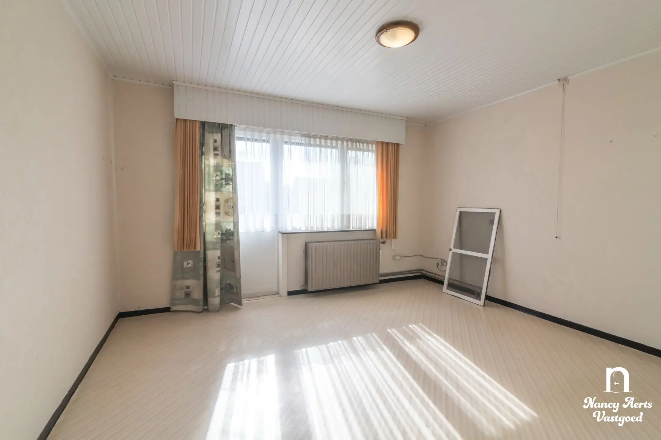 Karaktervolle woning met groene tuin in een rustige straat foto 21