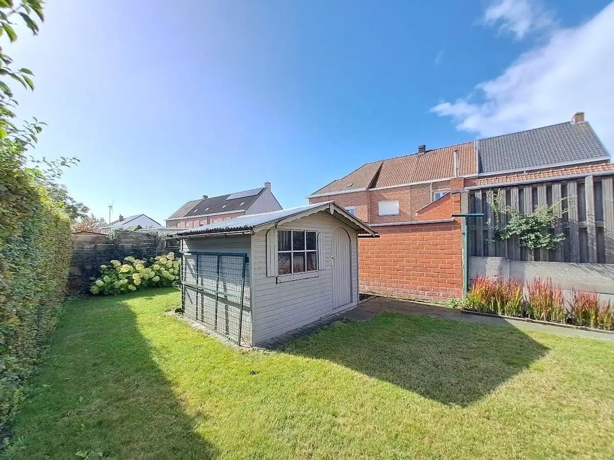 Lichtrijk gelijkvoers appartement met tuin en 2 slaapkamers en garage foto 14