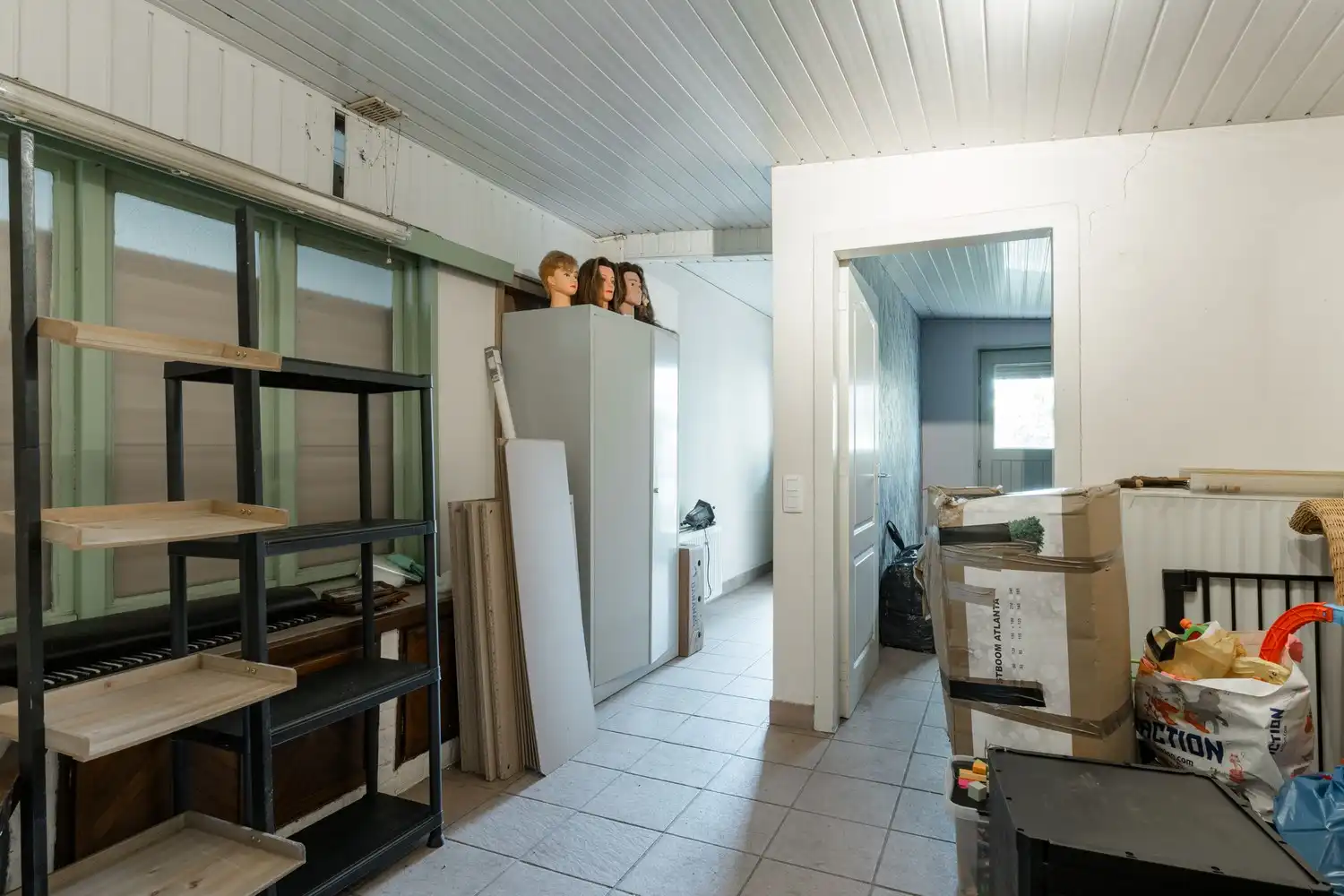 Veelzijdige woning met zorgmogelijkheden, werkruimte en tal van bijgebouwen foto 52