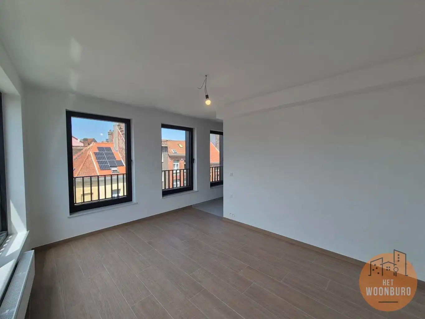 Nieuwbouw duplex met 2 slpks, bureel, terras en kelder foto 5