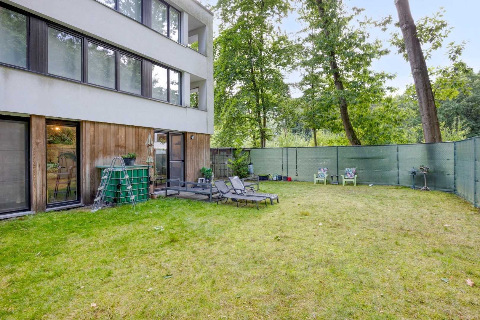 Gelijkvloers appartement met 2 slpks, ruime tuin, autostaanplaats en optionele garage ! foto 16