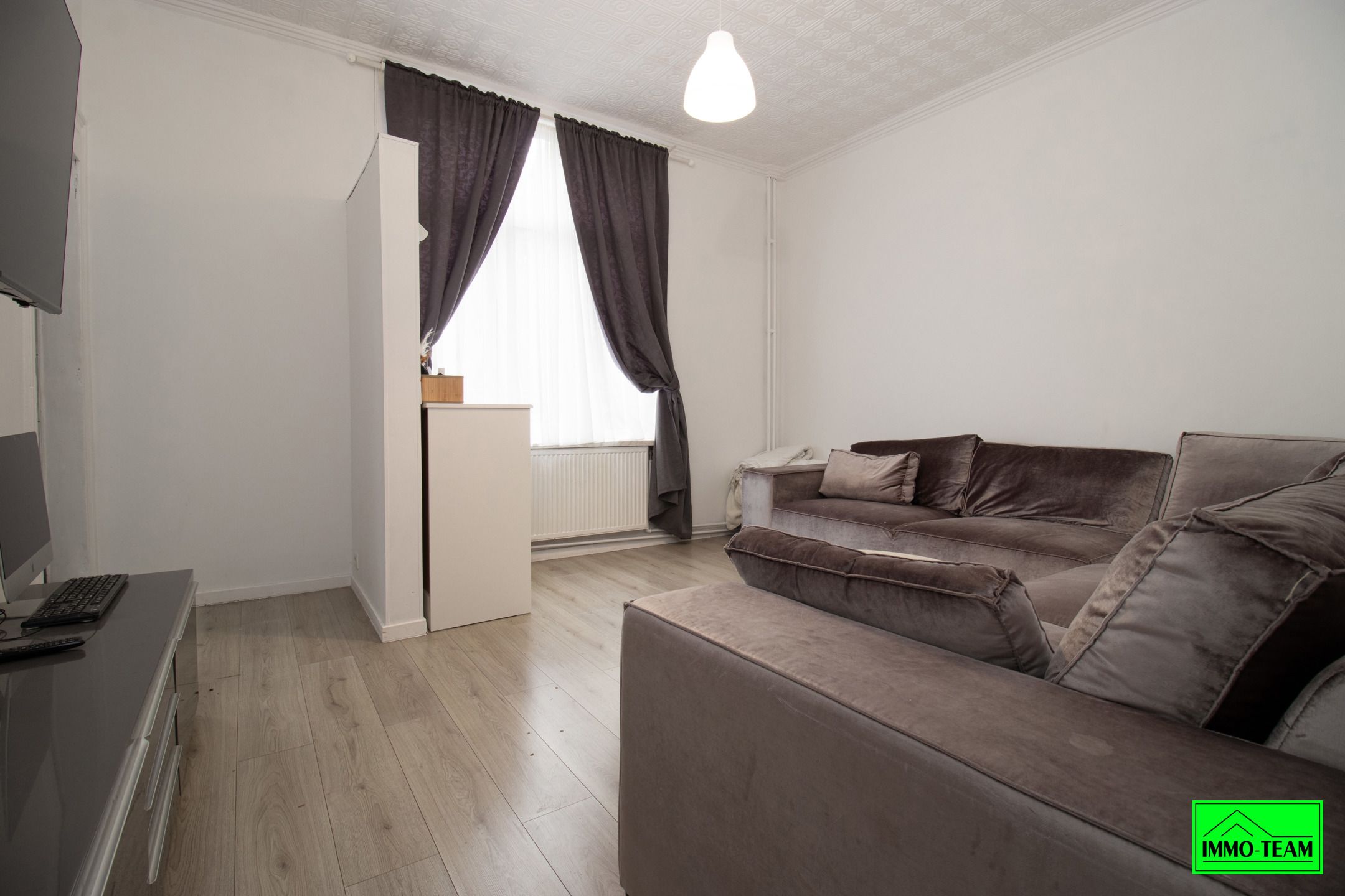 Opbrengsteigendom met handelszaak en 2 duplexappartementen foto 18