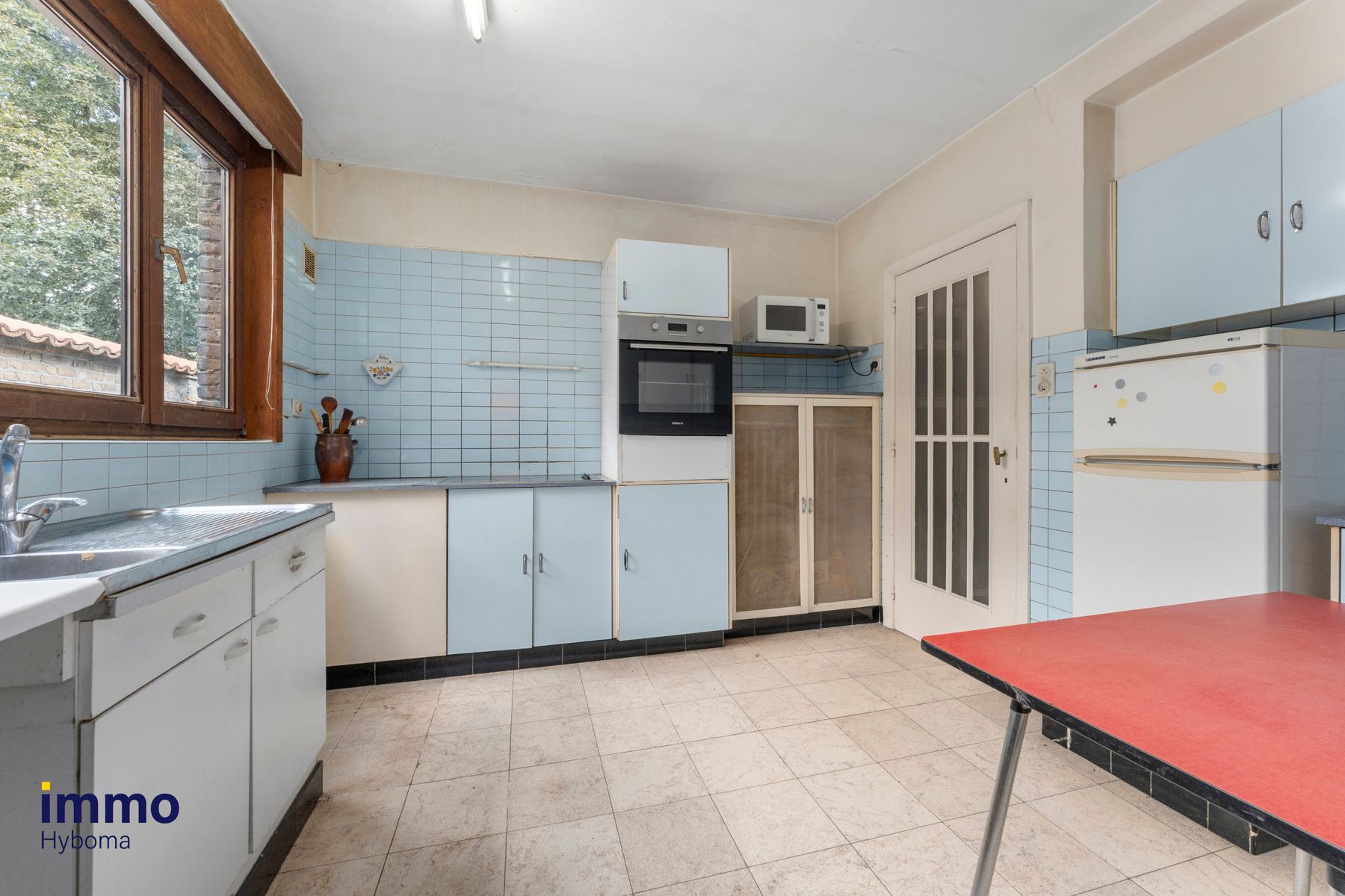 Karaktervolle woning met praktijkgedeelte in hartje Eeklo foto 6