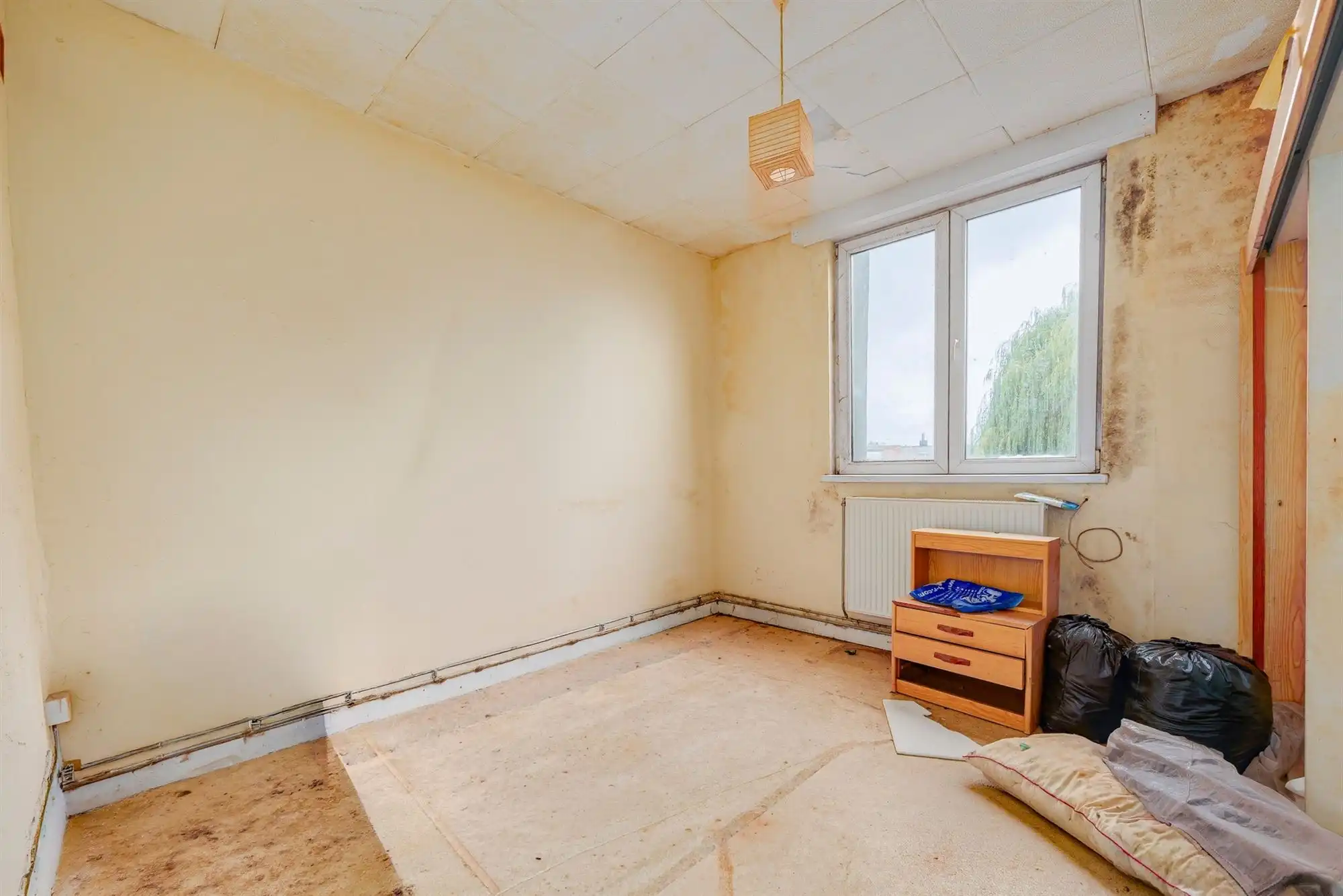 Volledig te renoveren huis met ruime tuin en tal van mogelijkheden! foto 6