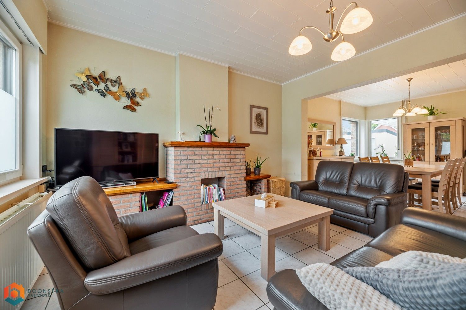 Verzorgde woning met 2 slpkrs, leuke tuin en garage foto 3