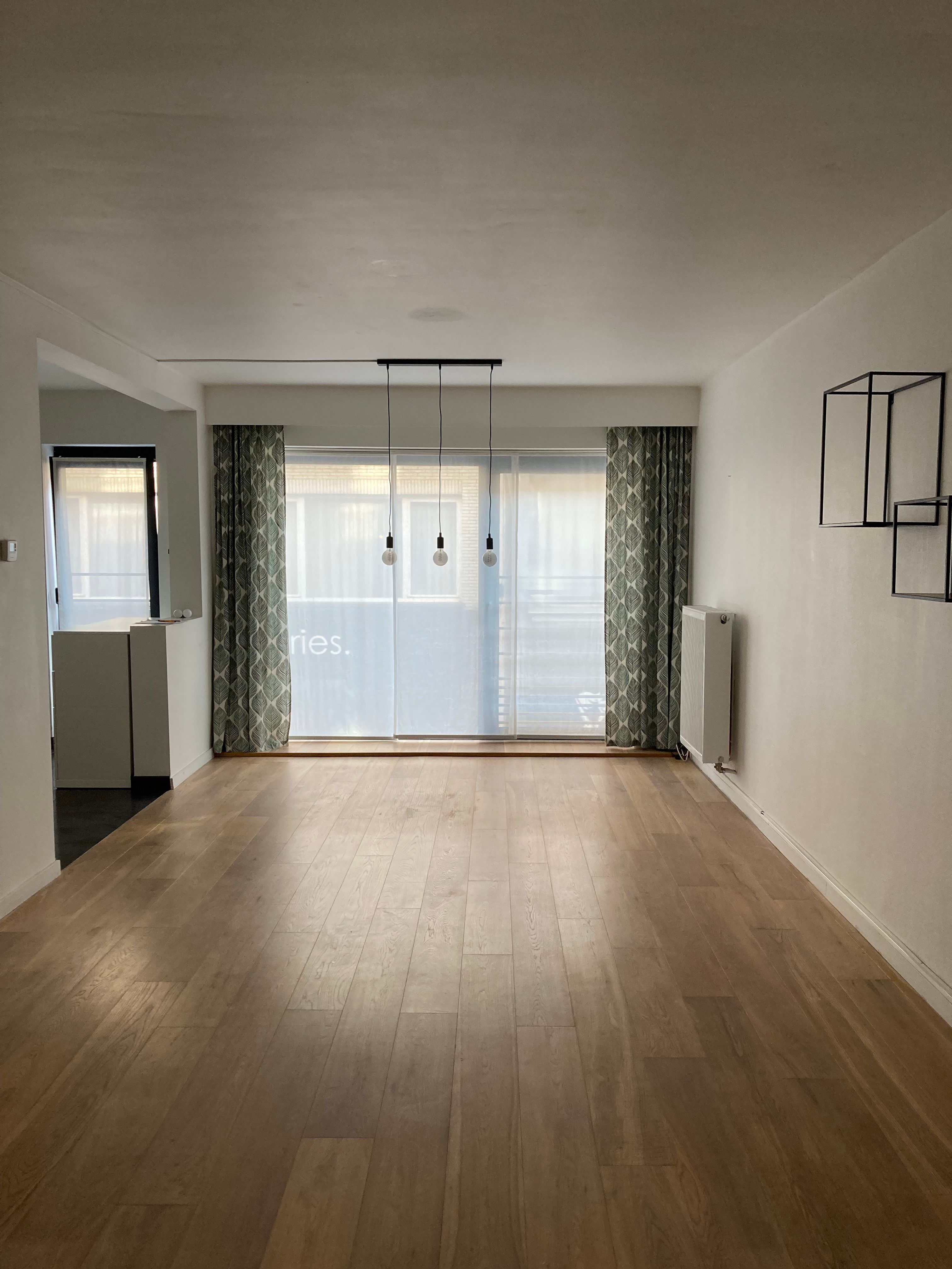 Instapklaar éénslaapkamerappartement met terras in centrum Beveren foto 6