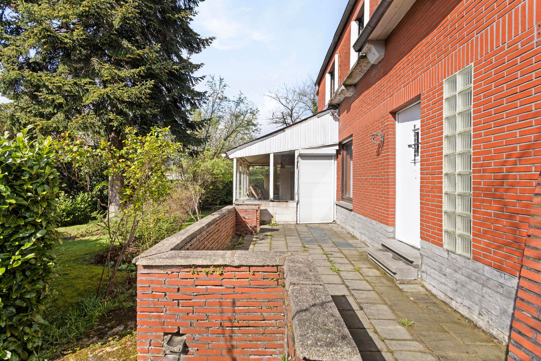 Viergevelwoning van 209m² met tuin foto 28