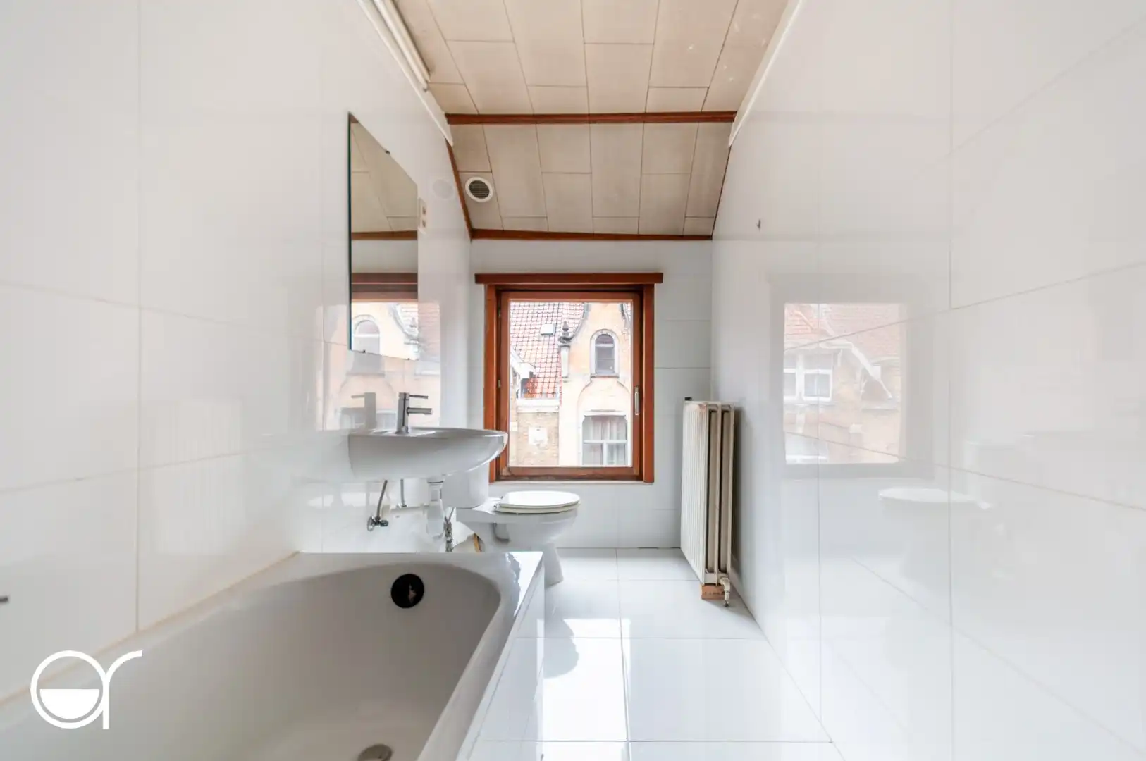 Opbrengsteigendom met 2 appartementen gelegen vlakbij het Sint-baafskouterpark & Rozebroeken.  foto 24